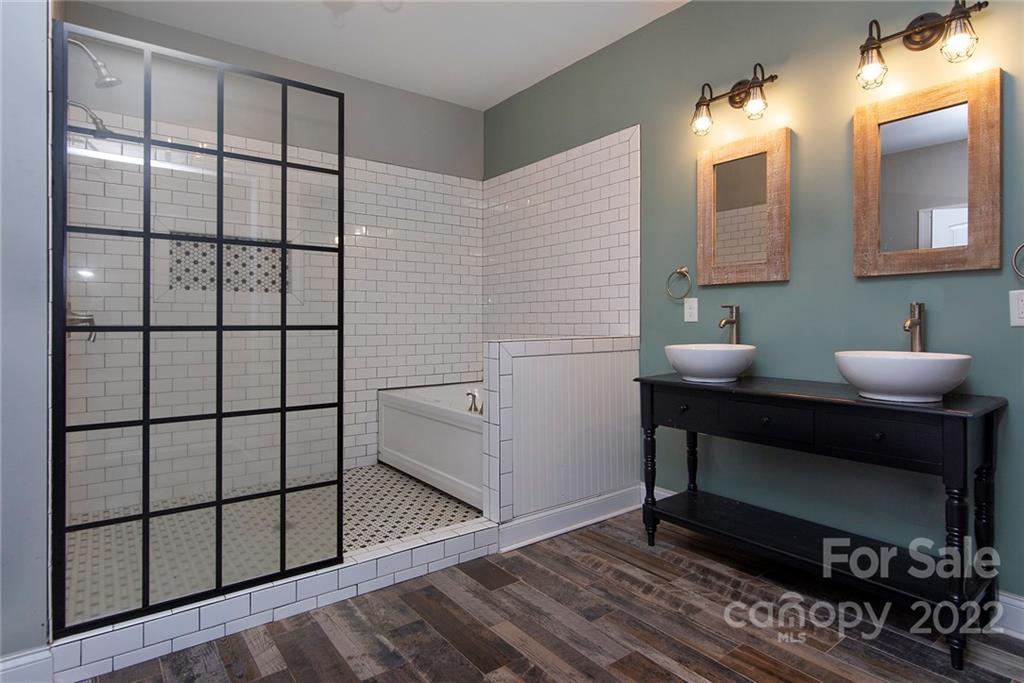 345 Lm Overcash Road Salisbury, NC 28146 - Photo 18 of 23 a bathroom with a sink and a mirror