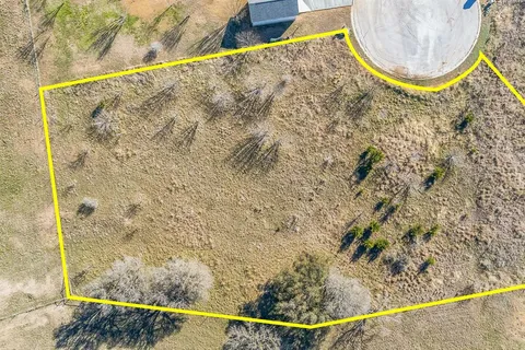 a view of a swimming pool with a backyard