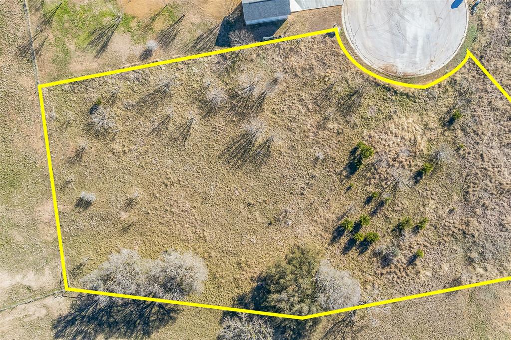 104 Round Up Circle Burnet, TX 78611 - Photo 3 of 17 a view of a swimming pool with a backyard