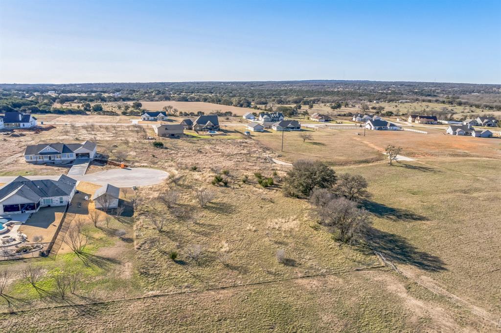 104 Round Up Circle Burnet, TX 78611 - Photo 8 of 17 an aerial view of residential building and ocean view in back