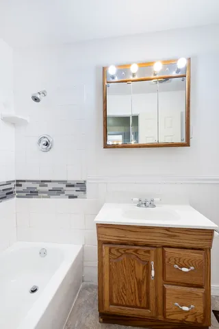 a bathroom with a sink and a bathtub