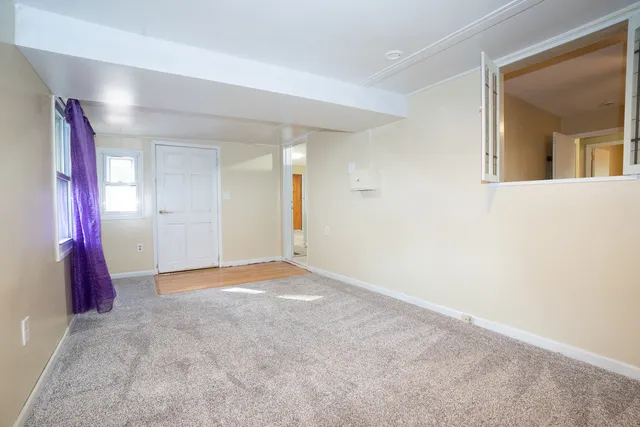 a view of an empty room with window