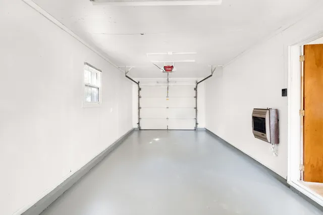 a view of a porch with wooden floor
