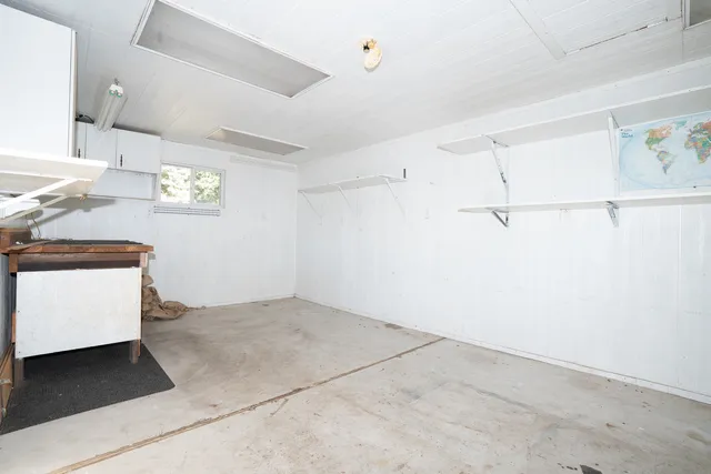 a view of kitchen with furniture and fireplace