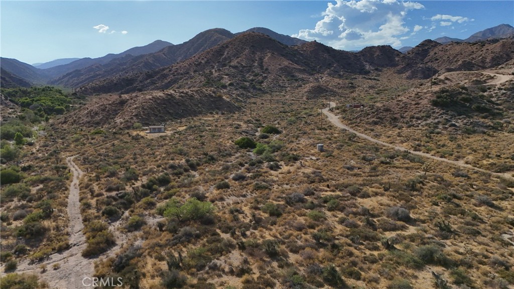 752 Big Morongo Canyon Road Morongo Valley, CA 92256 - Photo 4 of 11 Red boundary lines on pictures are an estimate and for marketing purposes only. Buyer to verify all aspects of this property including, but not limited to utilities, assessments, boundaries, usage, access, and zoning to satisfy themselves.
