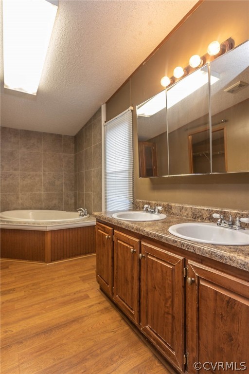 6400 Hair Road Disputanta, VA 23842 - Photo 19 of 30 a bathroom with a tub sink and mirror