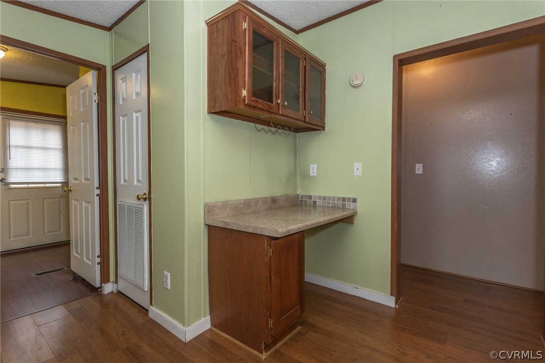 6400 Hair Road Disputanta, VA 23842 - Photo 10 of 30 an entryway with wooden floor and cabinet