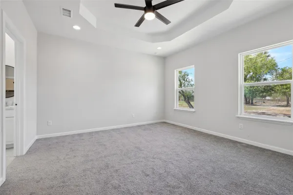 an empty room with windows