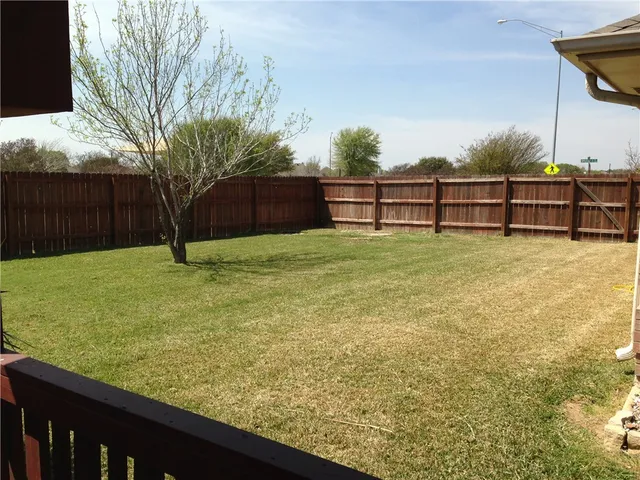 a room with a table and a mirror
