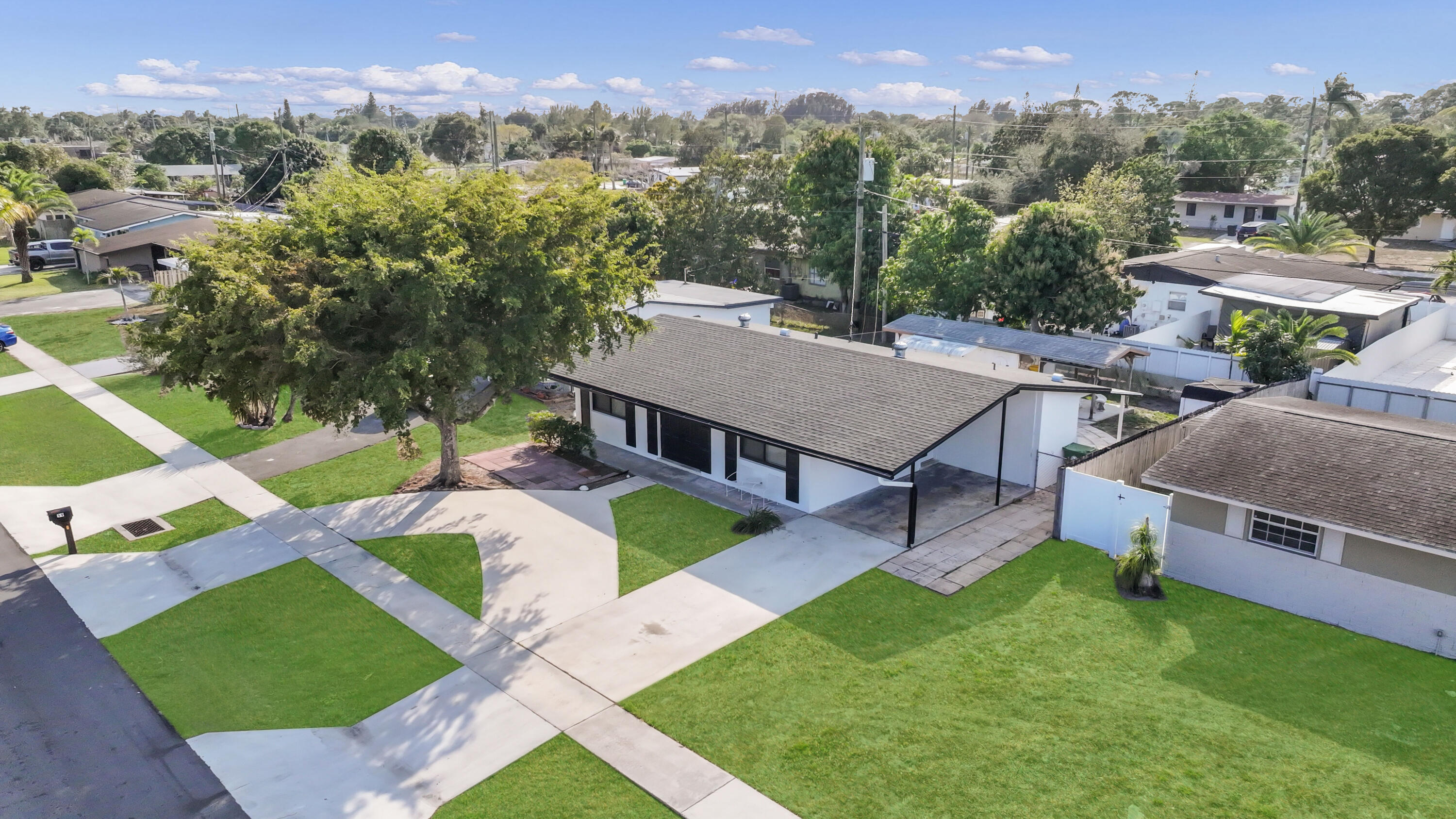 59 Andros Road Palm Springs, FL 33461 - Photo 1 of 24 DJI_20260227154245_0126_D