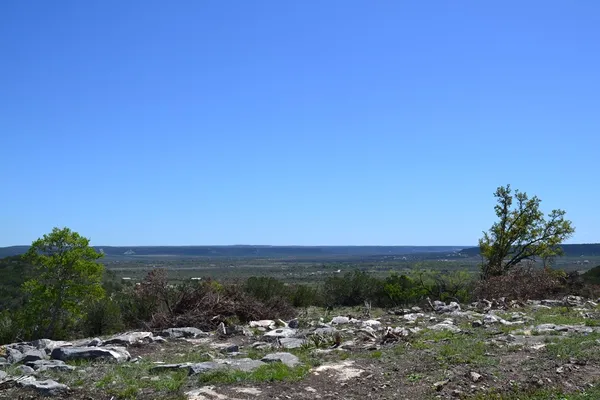 a view of a lake with a mountain in the background