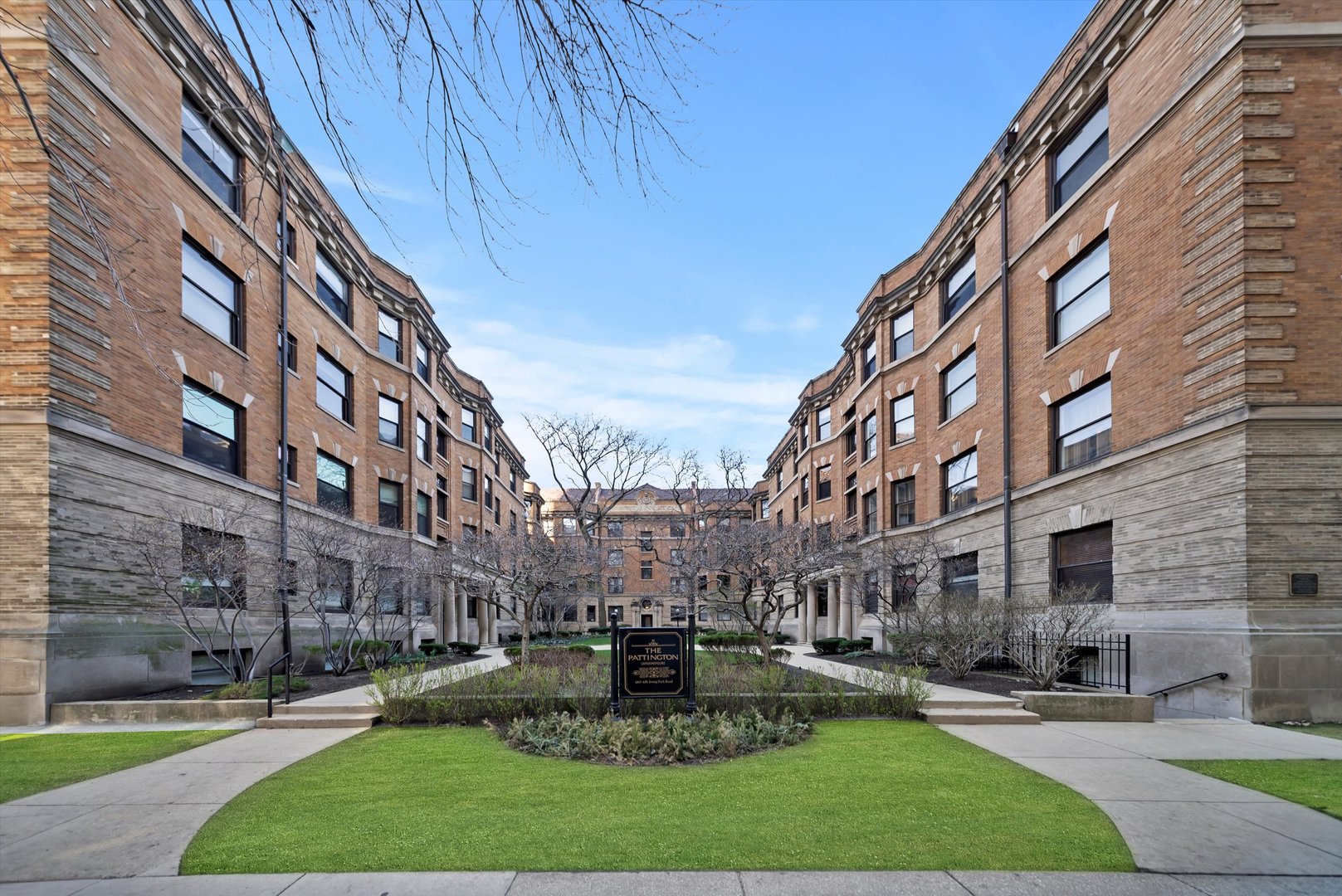 666 West Irving Park Road, Unit I4 Chicago, IL 60613 - Photo 1 of 27 a view of a building with a yard