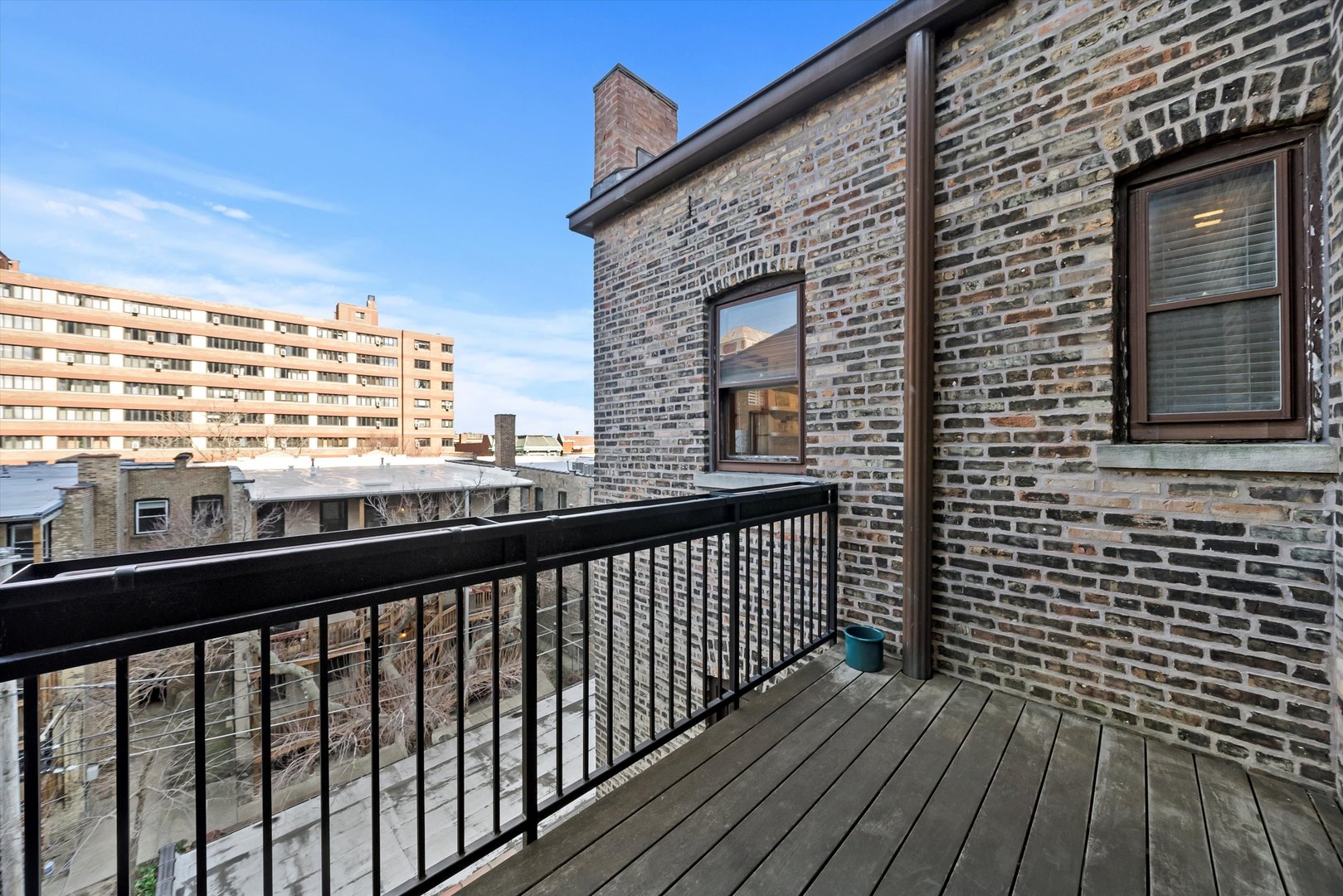 666 West Irving Park Road, Unit I4 Chicago, IL 60613 - Photo 11 of 27 a view of city from a balcony