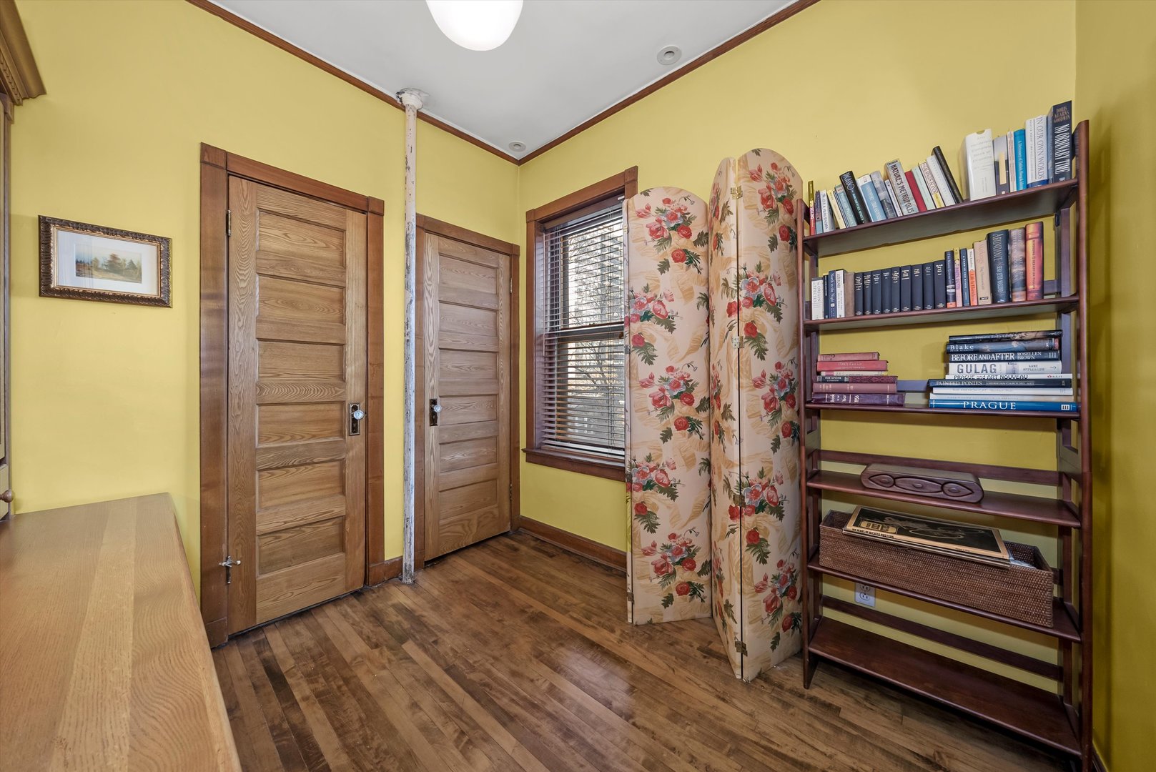 666 West Irving Park Road, Unit I4 Chicago, IL 60613 - Photo 26 of 27 a view of a bedroom with furniture and staircase