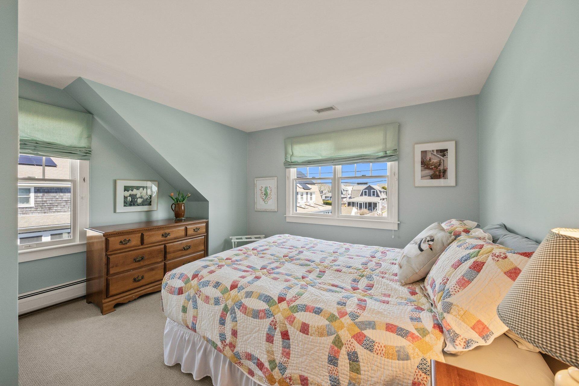 8 Wyndemere Bluffs Road Harwich Port, MA 02646 - Photo 22 of 37 a bedroom with a bed and a dresser