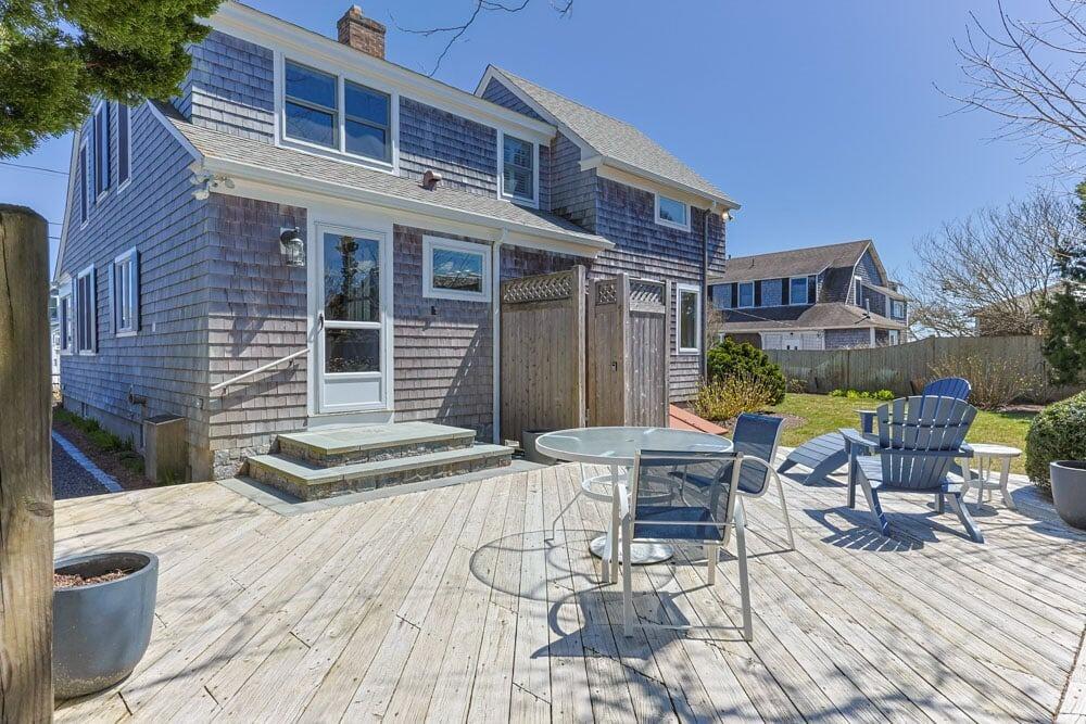 8 Wyndemere Bluffs Road Harwich Port, MA 02646 - Photo 31 of 37 a view of a building with sitting area