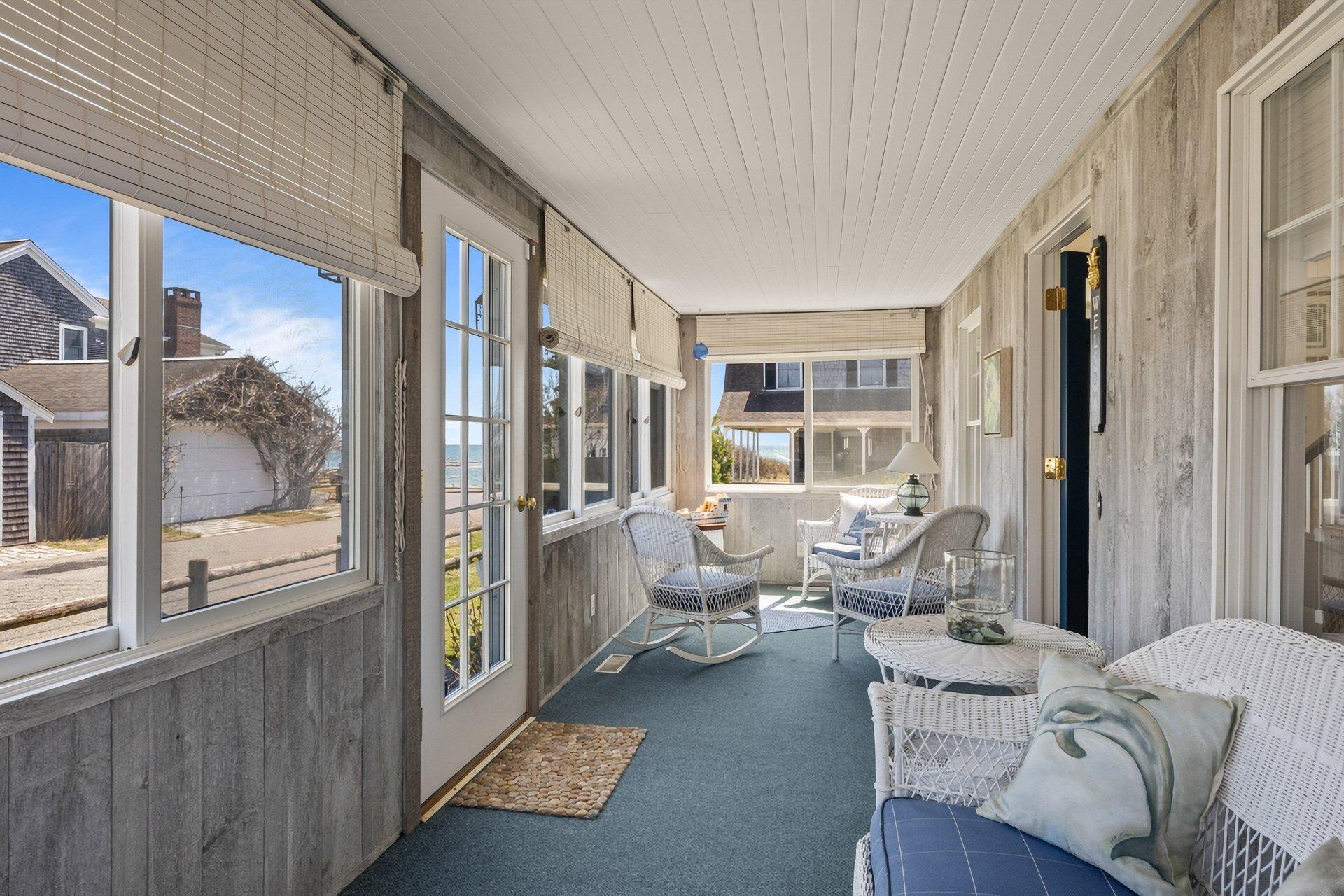 8 Wyndemere Bluffs Road Harwich Port, MA 02646 - Photo 6 of 37 a living room with furniture and a large window