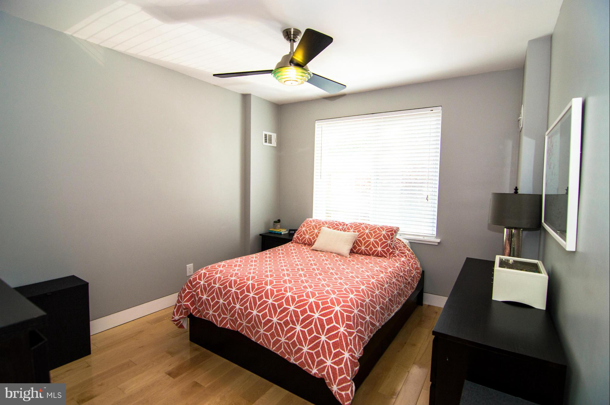 606 14th Place Northeast Washington, DC 20002 - Photo 18 of 28 a bedroom with a bed and a window