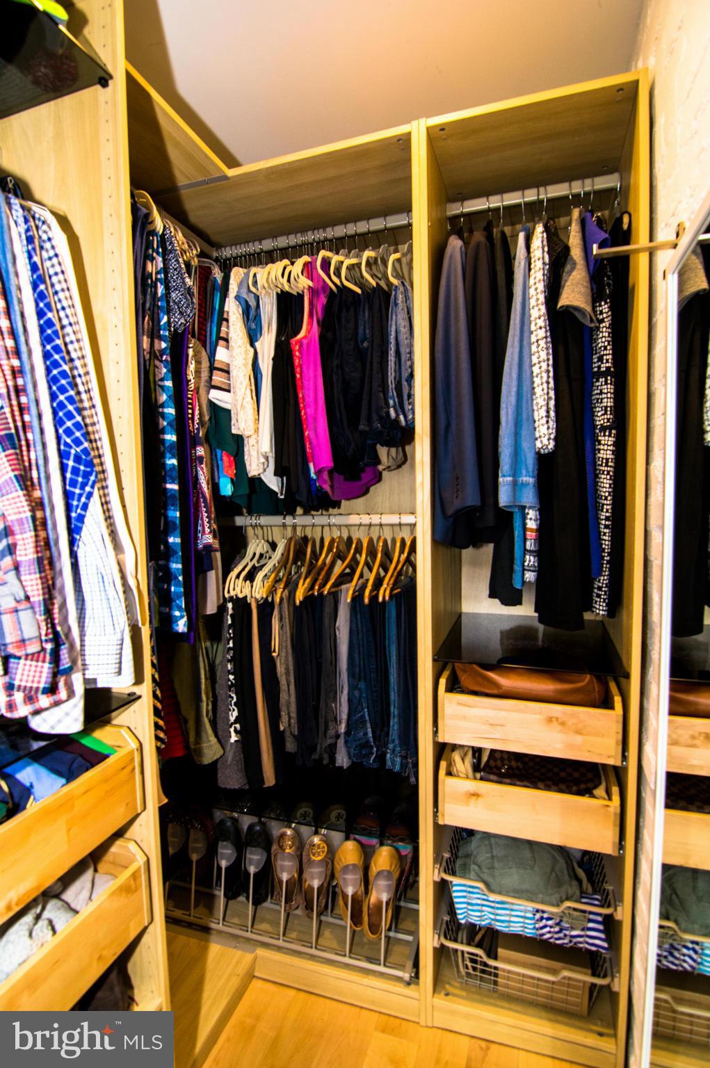 606 14th Place Northeast Washington, DC 20002 - Photo 20 of 28 a view of walk in closet with clothes and shoes