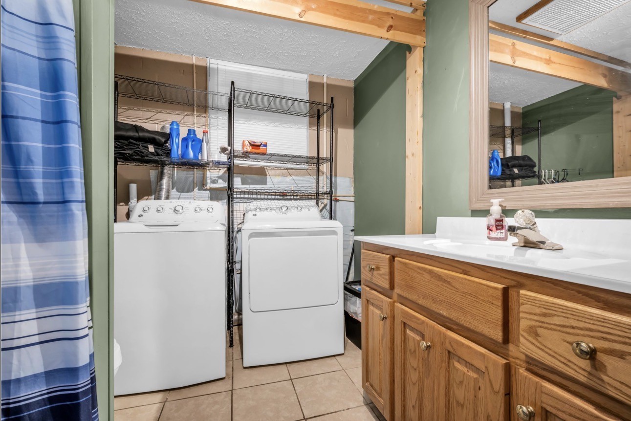 1051 Twin Pine Road Dickson, TN 37055 - Photo 17 of 29 a utility room with dryer and washer