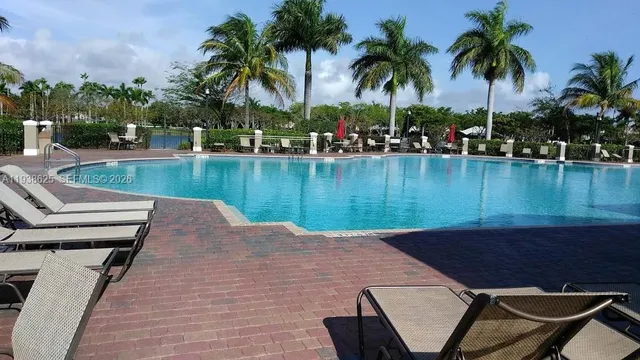 a view of a backyard with a patio