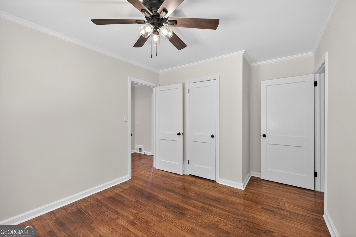 352 3rd Avenue Winder, GA 30680 - Photo 19 of 33 wooden floor in an empty room