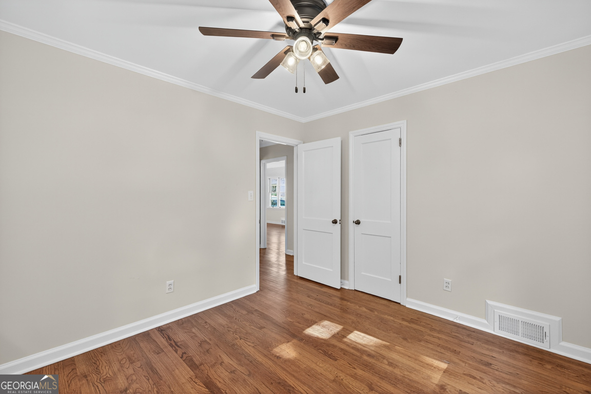352 3rd Avenue Winder, GA 30680 - Photo 26 of 33 wooden floor in an empty room