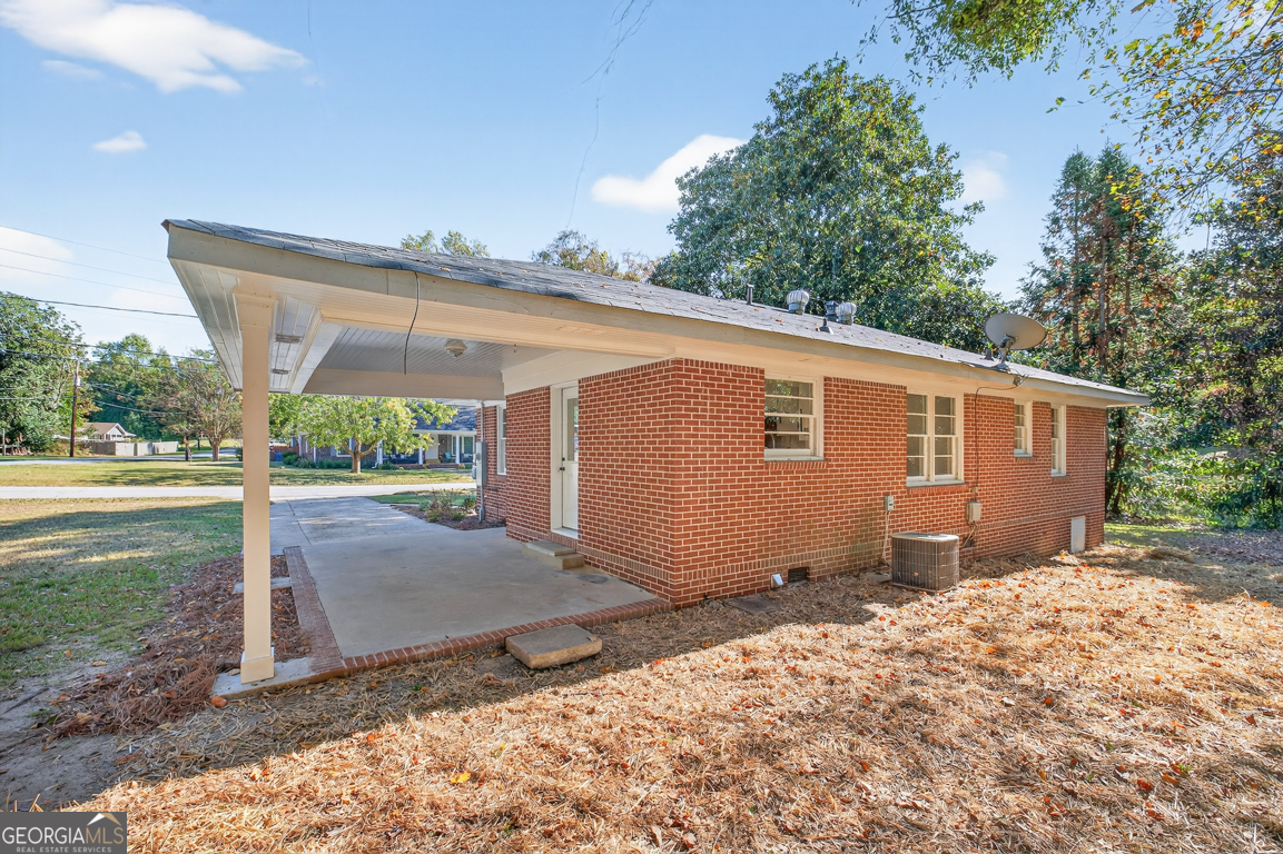 352 3rd Avenue Winder, GA 30680 - Photo 31 of 33 a view of a house with backyard