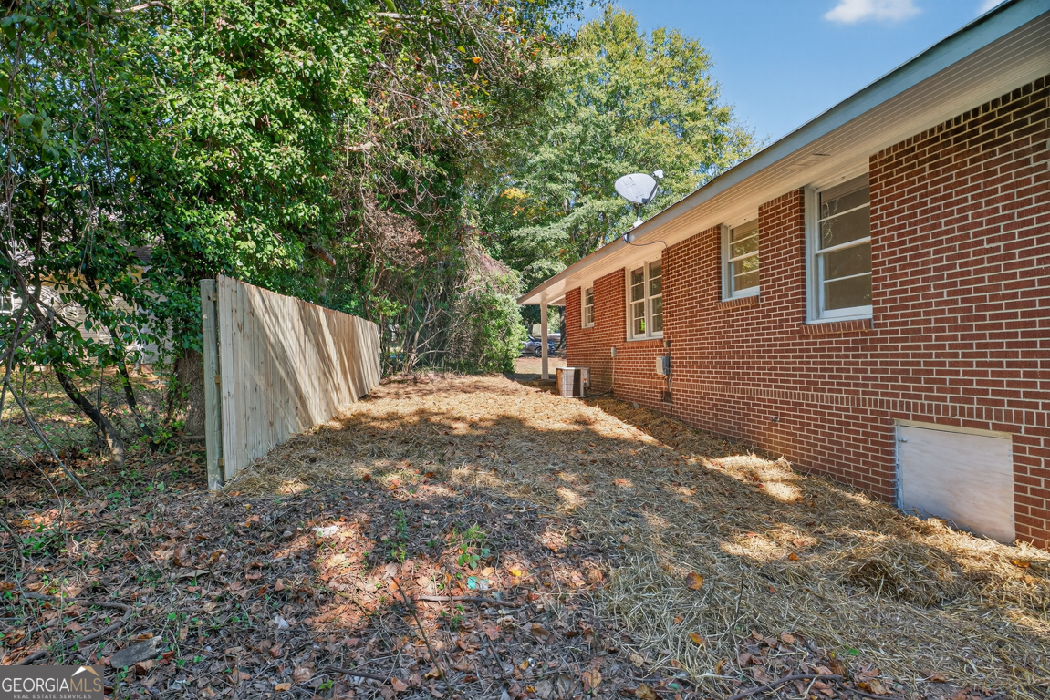 352 3rd Avenue Winder, GA 30680 - Photo 33 of 33 a backyard of a house with lots of green space