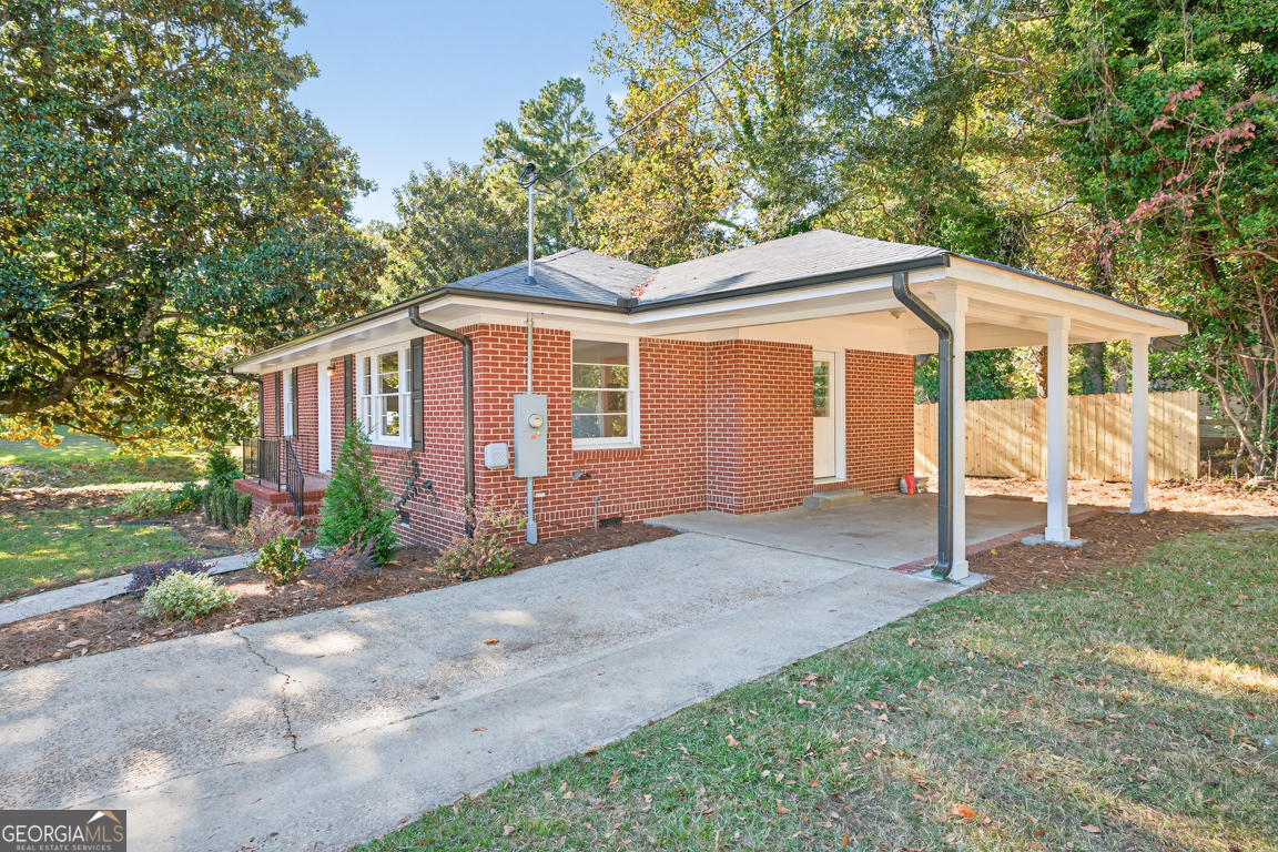352 3rd Avenue Winder, GA 30680 - Photo 4 of 33 a view of a house with a yard and large tree