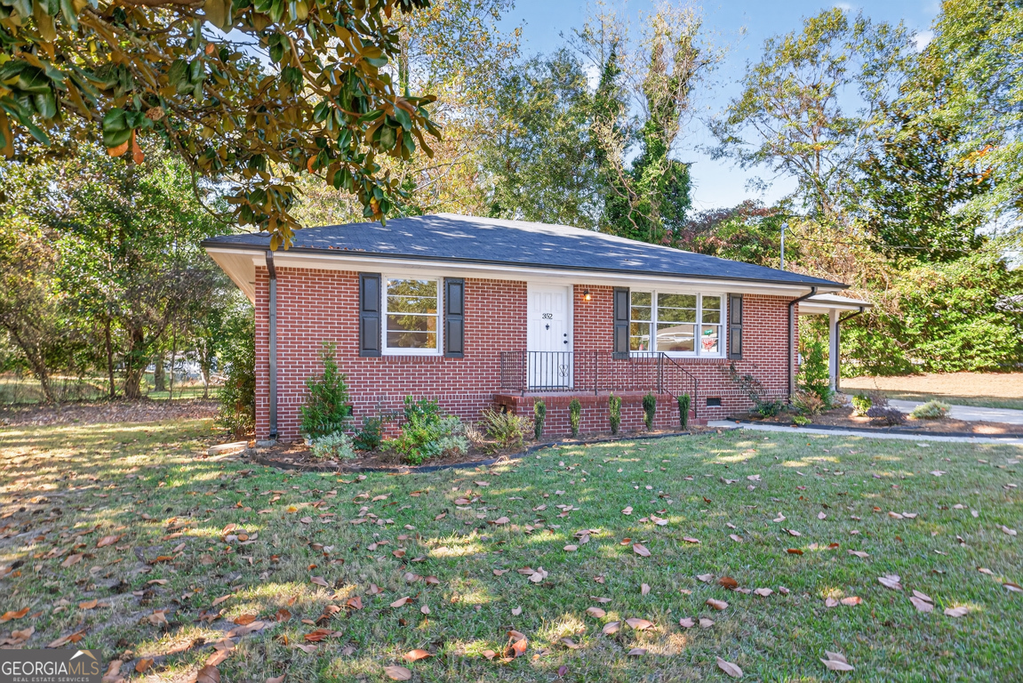 352 3rd Avenue Winder, GA 30680 - Photo 6 of 33 front view of a house with a yard