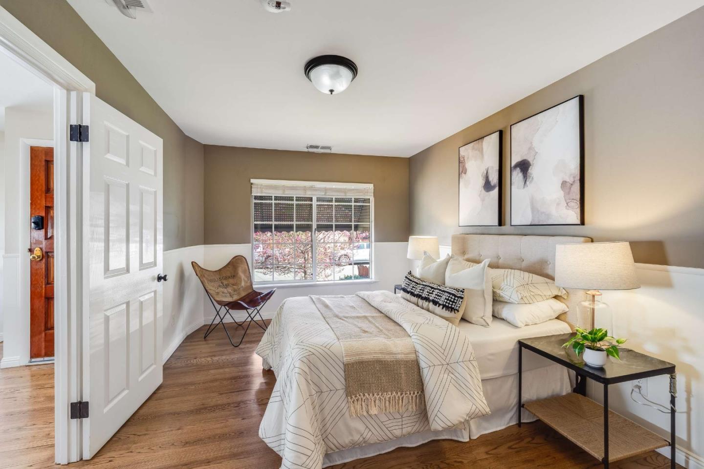 1256 Pierce Street Santa Clara, CA 95050 - Photo 17 of 46 a bedroom with a bed and wooden floor