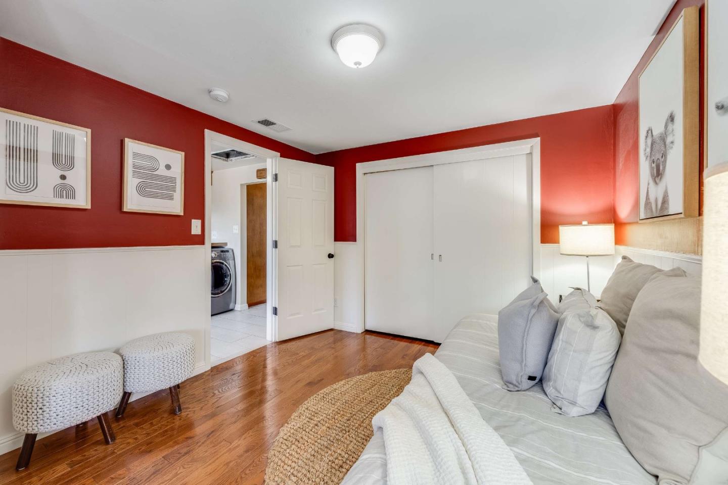 1256 Pierce Street Santa Clara, CA 95050 - Photo 21 of 46 a spacious bedroom with a bed and wooden floor