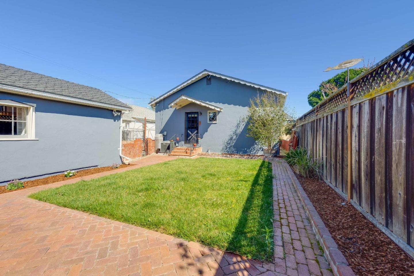 1256 Pierce Street Santa Clara, CA 95050 - Photo 32 of 46 a view of a house with backyard and porch