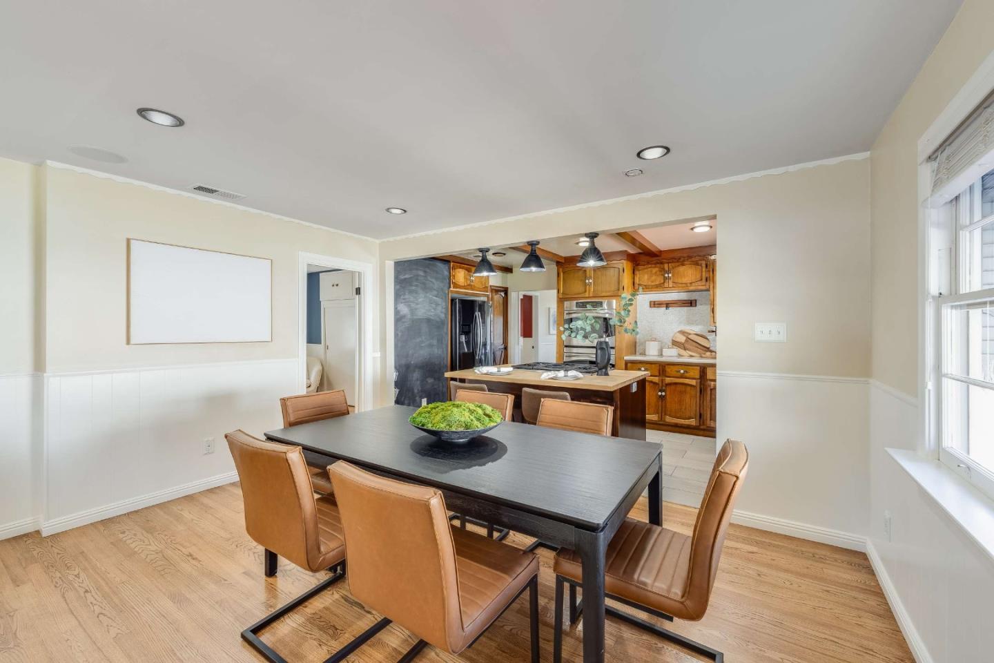 1256 Pierce Street Santa Clara, CA 95050 - Photo 8 of 46 a view of a dining room with furniture and wooden floor