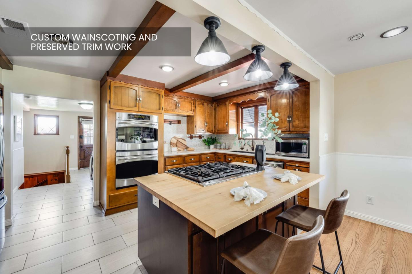 1256 Pierce Street Santa Clara, CA 95050 - Photo 10 of 46 a kitchen with stainless steel appliances granite countertop a stove refrigerator and a sink