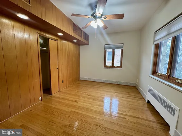 a view of a porch with wooden floor