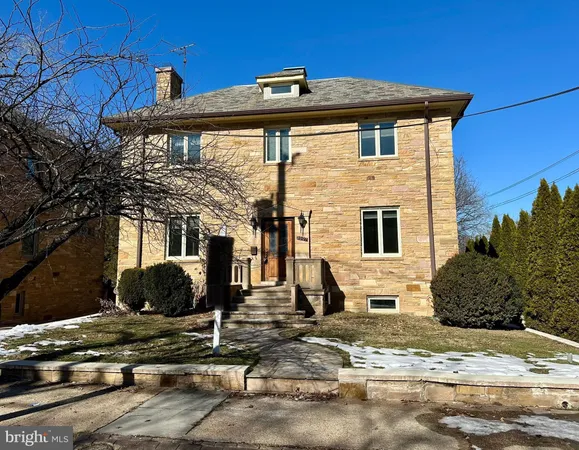 a front view of a house with entertaining space