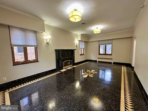 a view of a livingroom with wooden floor