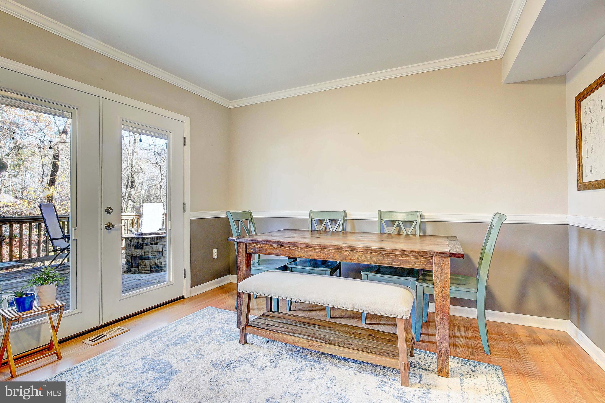 342 Metropolitan Boulevard Pasadena, MD 21122 - Photo 15 of 47 a bedroom with furniture and a window