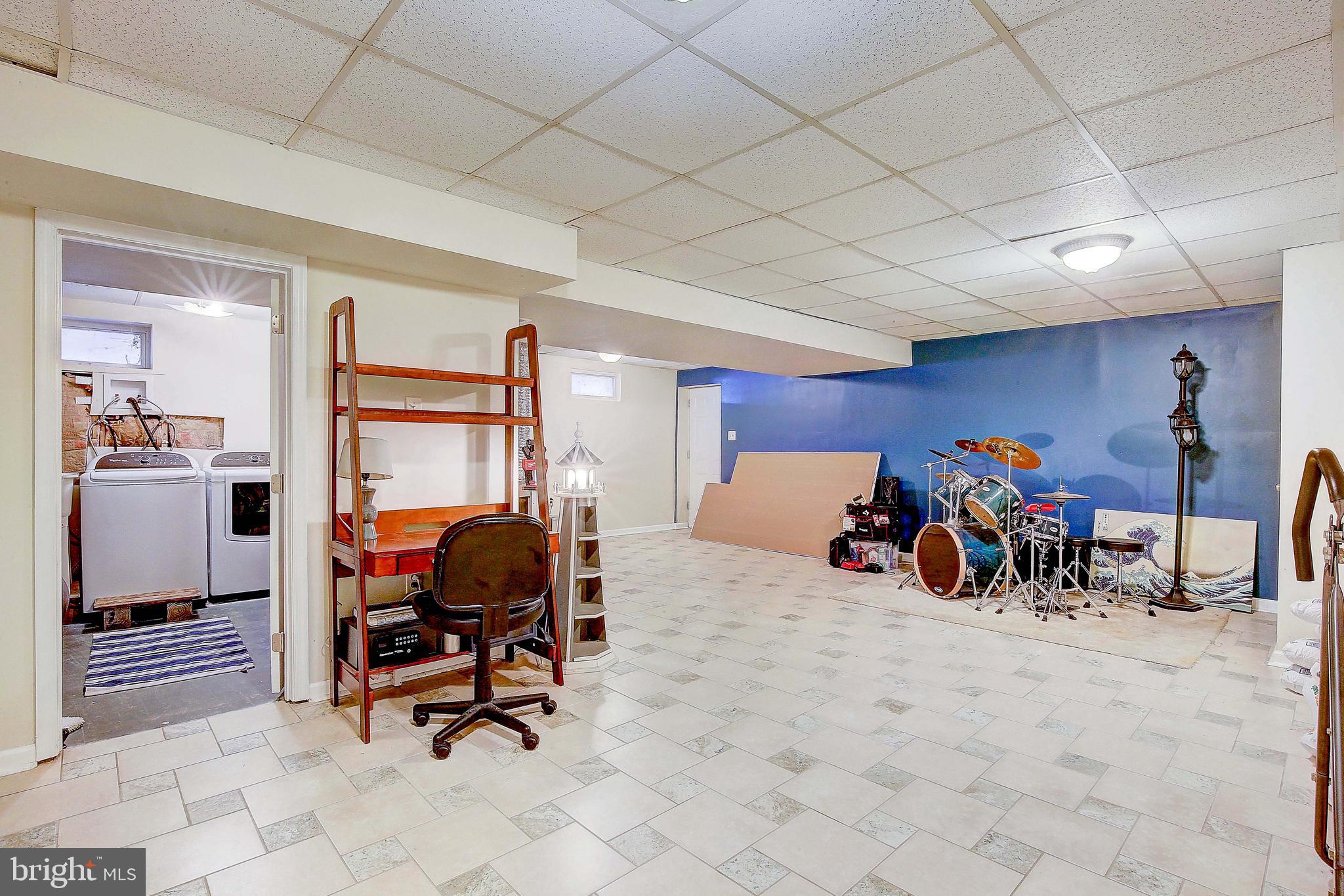 342 Metropolitan Boulevard Pasadena, MD 21122 - Photo 27 of 47 a view of a room with gym equipment