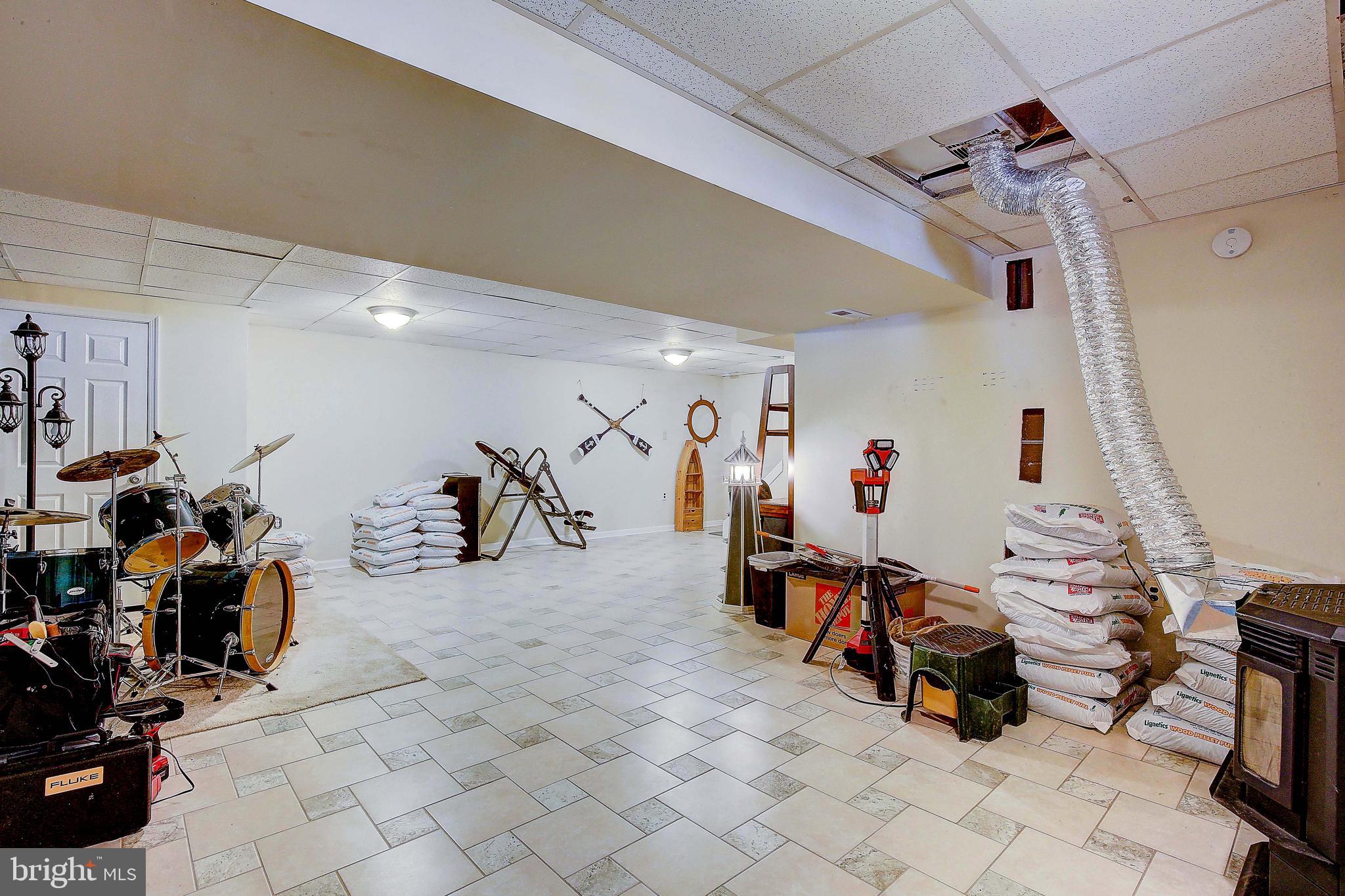 342 Metropolitan Boulevard Pasadena, MD 21122 - Photo 29 of 47 a view of a room with gym equipment