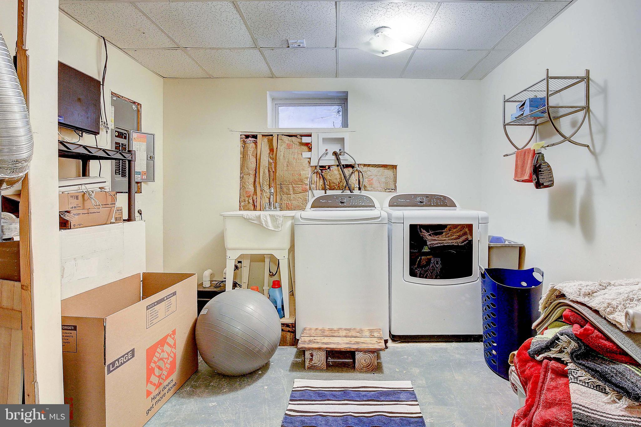 342 Metropolitan Boulevard Pasadena, MD 21122 - Photo 30 of 47 a bedroom with furniture and a bed