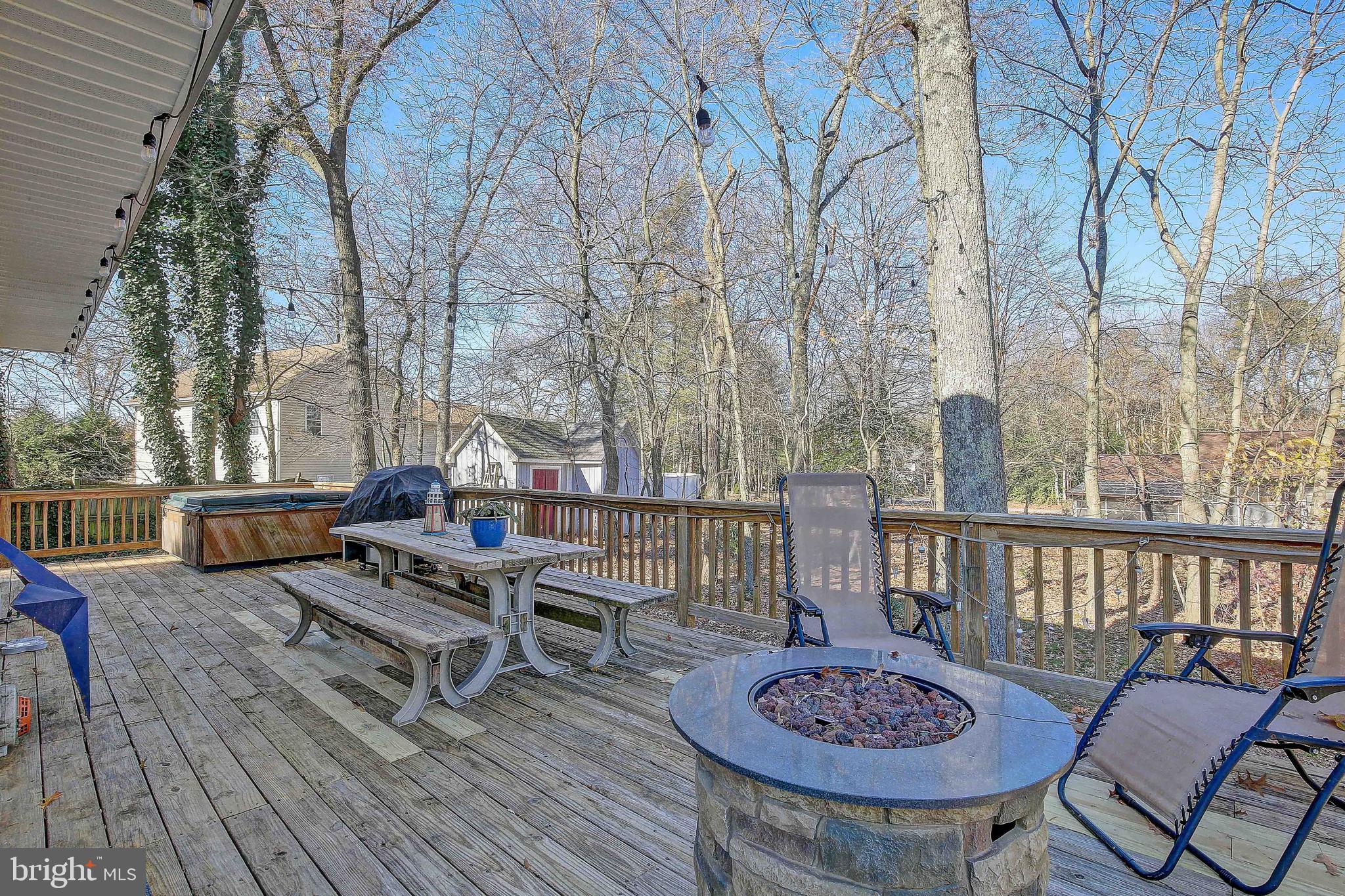 342 Metropolitan Boulevard Pasadena, MD 21122 - Photo 31 of 47 a view of a chairs and tables on the roof deck