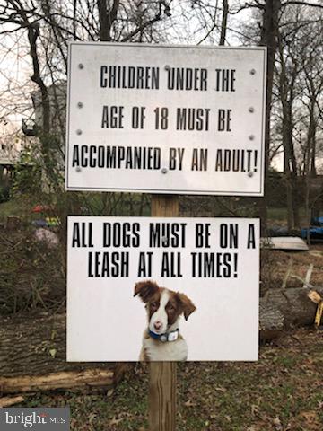 342 Metropolitan Boulevard Pasadena, MD 21122 - Photo 47 of 47 front view of a house with a fence