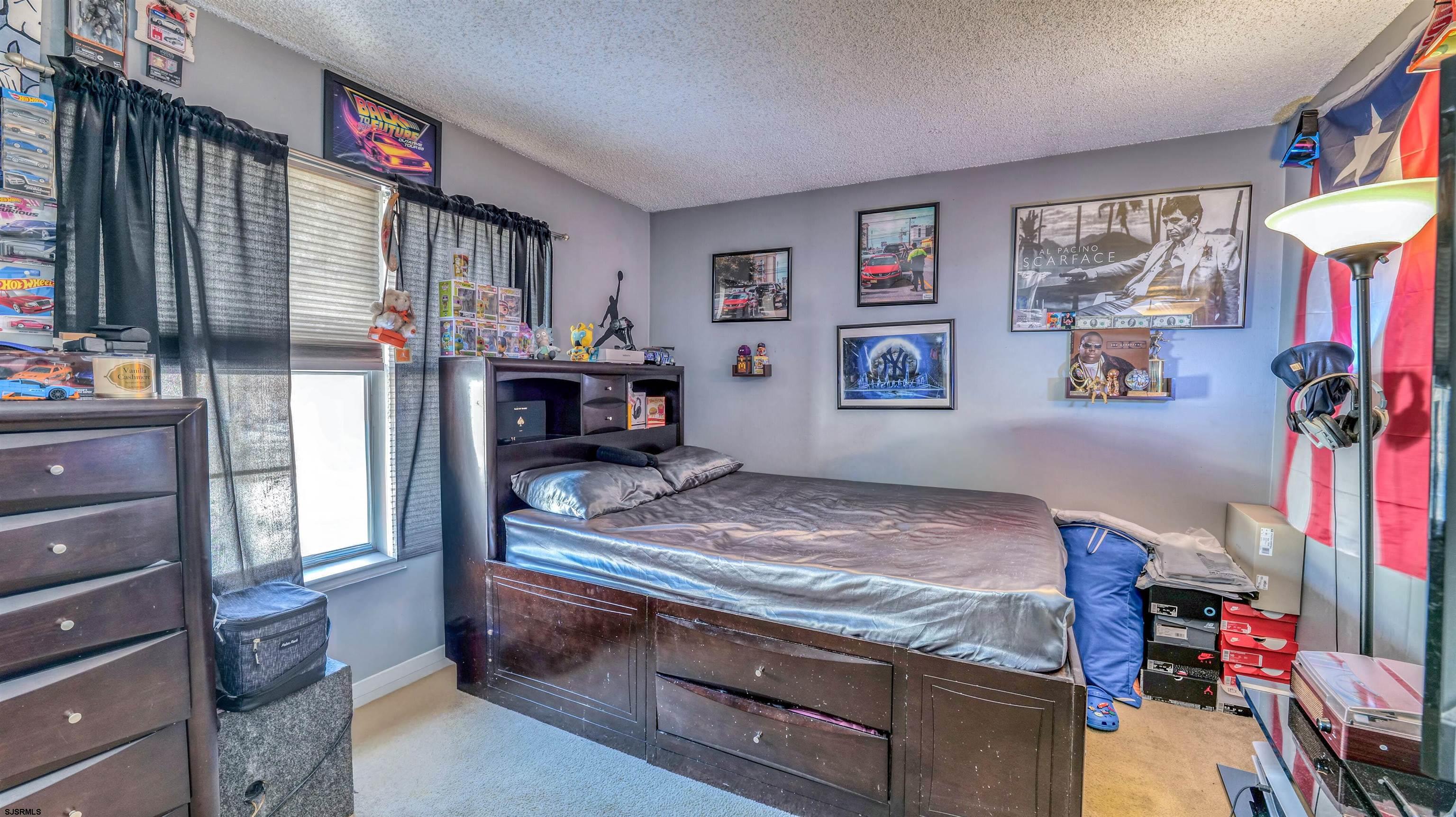 151 Concord Terrace Galloway Township, NJ 08205 - Photo 19 of 23 a living room with furniture and a flat screen tv