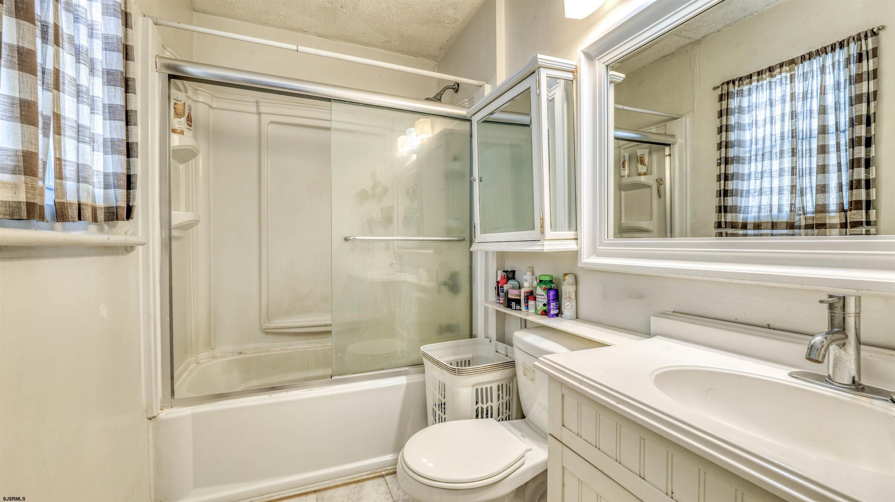 151 Concord Terrace Galloway Township, NJ 08205 - Photo 23 of 23 a bathroom with a sink toilet vanity and shower