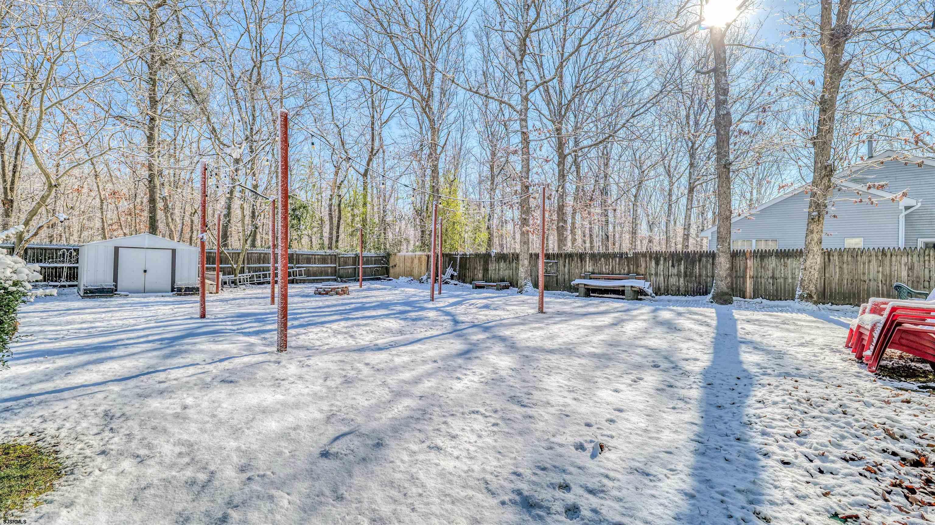 151 Concord Terrace Galloway Township, NJ 08205 - Photo 3 of 23 a view of a backyard with a large tree