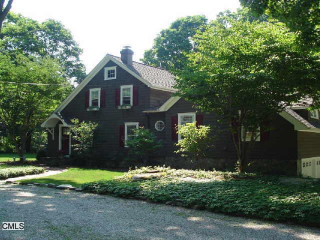 51 Old South Salem Road Ridgefield, CT 06877 - Photo 1 of 1 a front view of a house with a yard