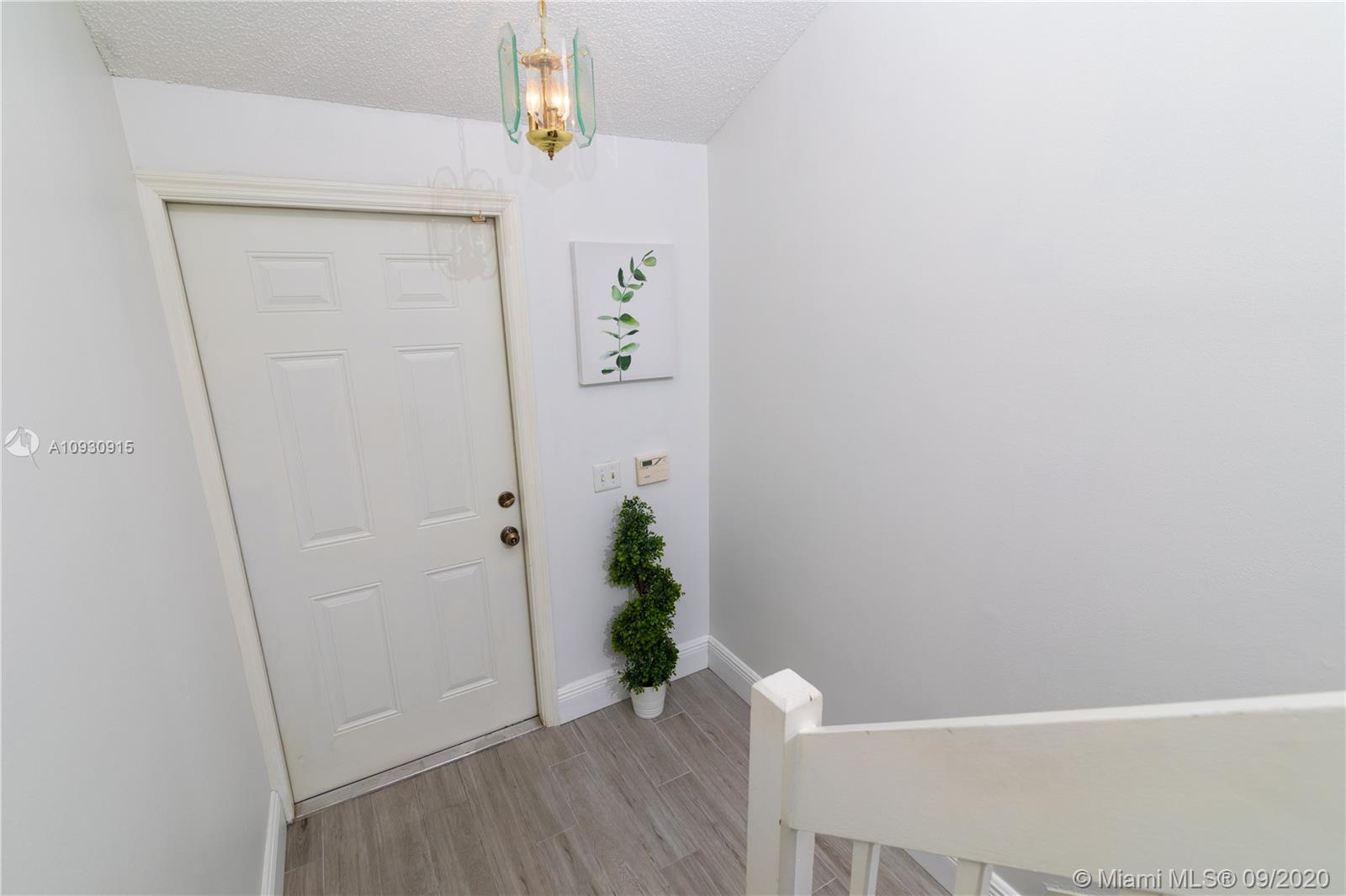6607 Via Regina Boca Raton, FL 33433 - Photo 15 of 40 a view of a hallway
